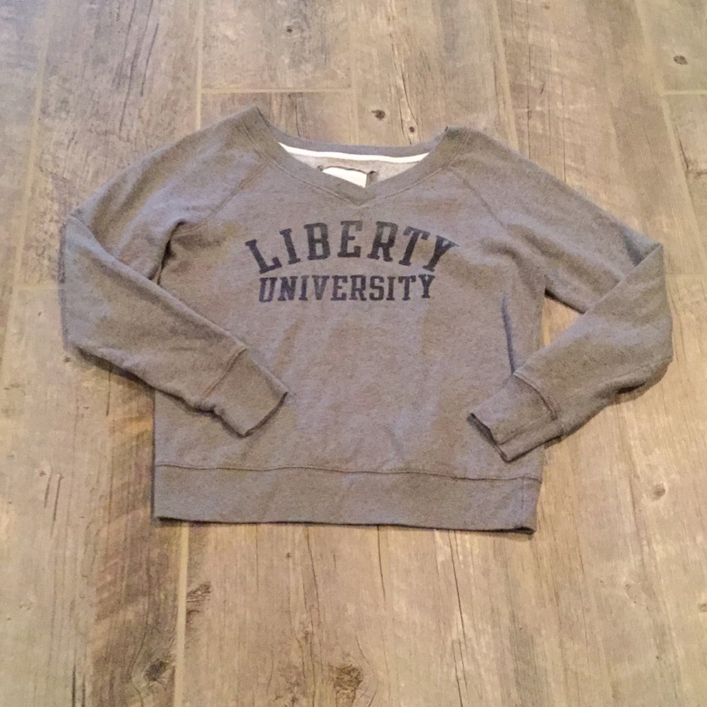 Red shirt woman’s liberty university sweatshirt
